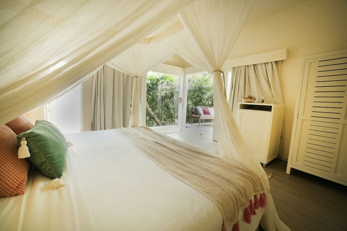 Imagen de la habitación del Hotel The Chillhouse Canggu. Foto 18
