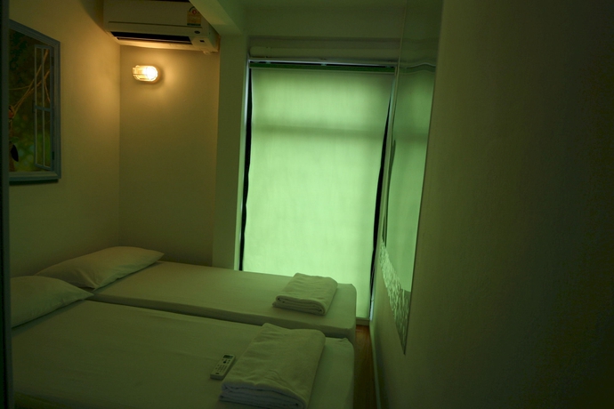 Imagen de la habitación del Hotel The Chilli Bangkok. Foto 8