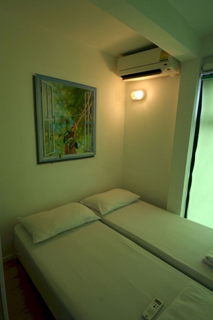 Imagen de la habitación del Hotel The Chilli Bangkok. Foto 9