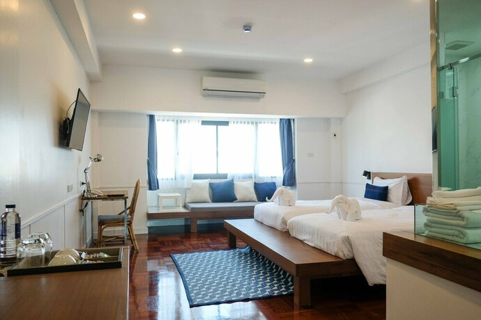 Imagen de la habitación del Hotel The Chimes Chiangmai Old City. Foto 13