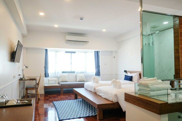 Imagen de la habitación del Hotel The Chimes Chiangmai Old City. Foto 16