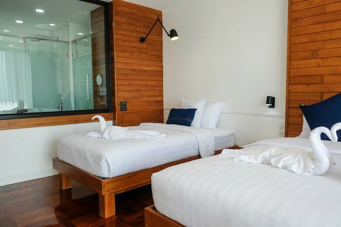 Imagen de la habitación del Hotel The Chimes Chiangmai Old City. Foto 18