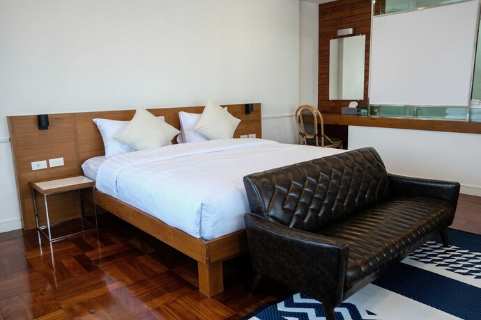 Imagen de la habitación del Hotel The Chimes Chiangmai Old City. Foto 19