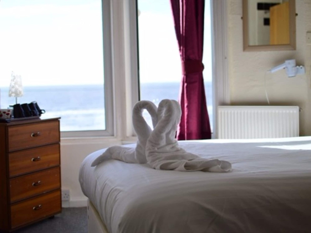 Imagen de la habitación del Hotel The Chimes On The Sea. Foto 6