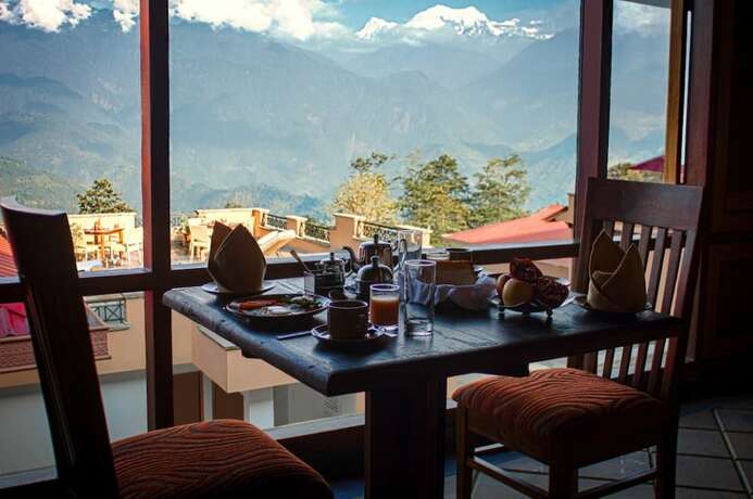 Imagen del bar/restaurante del Hotel The Chumbi Mountain Retreat. Foto 20