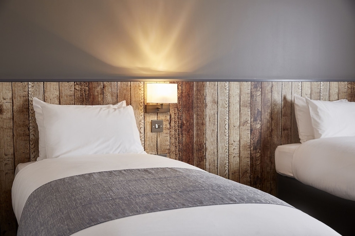 Imagen de la habitación del Hotel The Churchill By Greene King Inns. Foto 2
