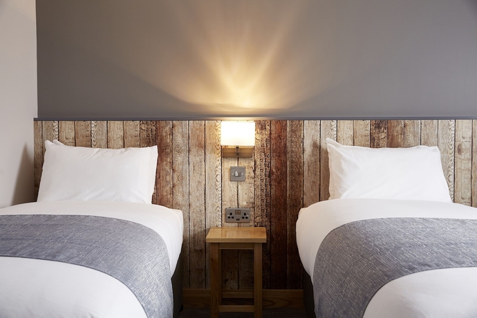 Imagen de la habitación del Hotel The Churchill By Greene King Inns. Foto 3