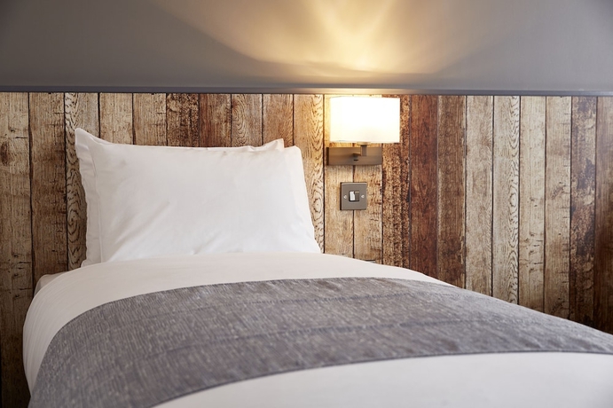 Imagen de la habitación del Hotel The Churchill By Greene King Inns. Foto 6