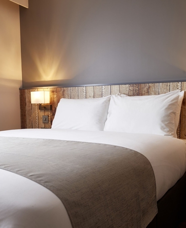Imagen de la habitación del Hotel The Churchill By Greene King Inns. Foto 10