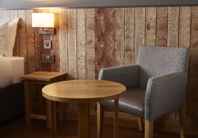 Imagen de la habitación del Hotel The Churchill By Greene King Inns. Foto 11