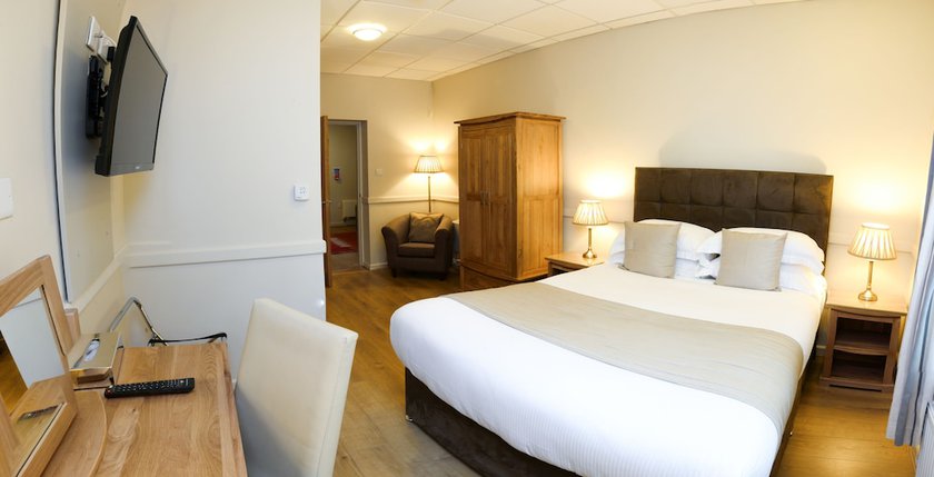 Imagen de la habitación del Hotel The Churchill Court. Foto 3