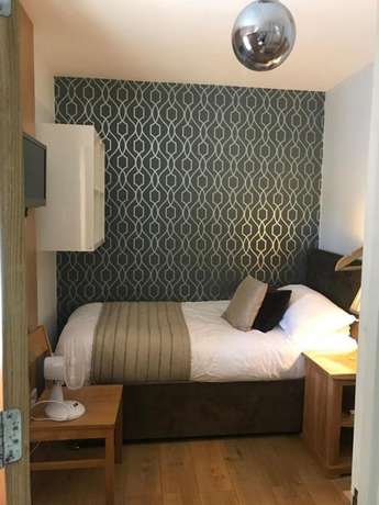 Imagen de la habitación del Hotel The Churchill Court. Foto 4