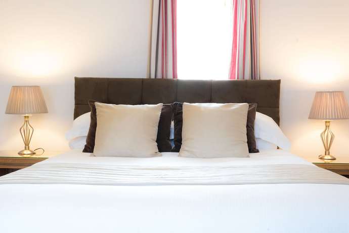 Imagen de la habitación del Hotel The Churchill Court. Foto 5