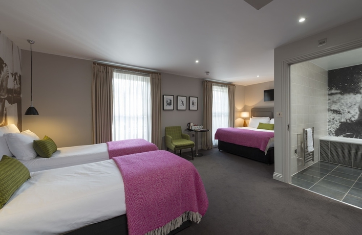 Imagen de la habitación del Hotel The Churchill. Foto 7