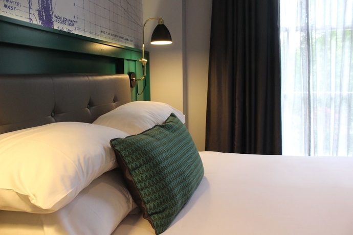 Imagen de la habitación del Hotel The Churchill. Foto 10