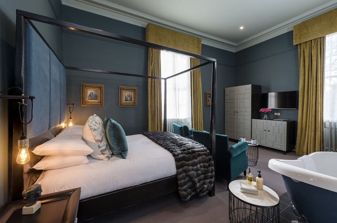 Imagen de la habitación del Hotel The Churchill. Foto 17