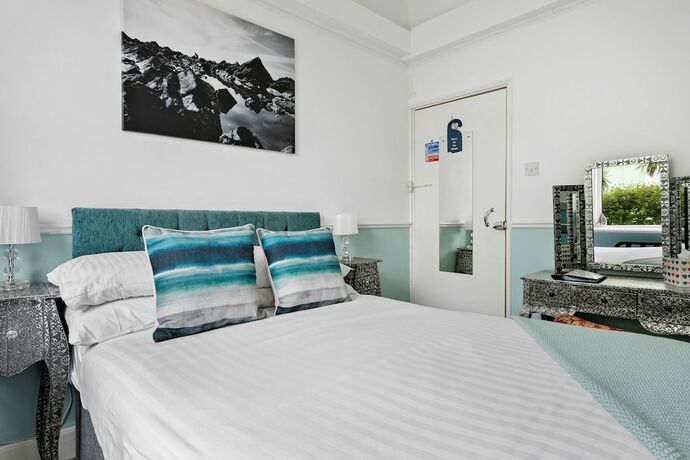 Imagen de la habitación del Hotel The Cimon. Foto 19