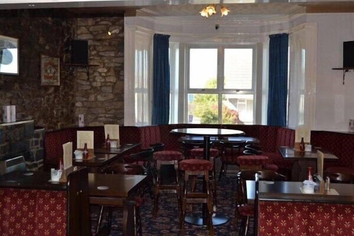 Imagen del bar/restaurante del Hotel The City Inn. Foto 4