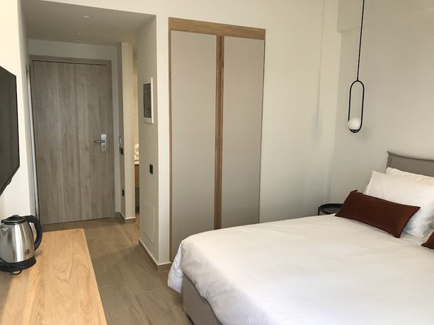 Imagen de la habitación del Hotel The City and Suites. Foto 12