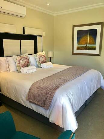 Imagen de la habitación del Hotel The Clan Guest House. Foto 11