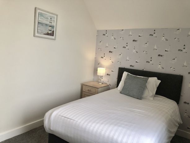 Imagen de la habitación del Hotel The Clarendon. Foto 10