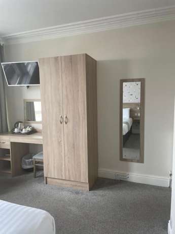 Imagen de la habitación del Hotel The Clarendon. Foto 11