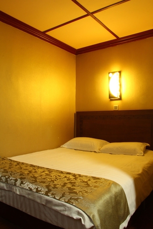 Imagen de la habitación del Hotel The Classic Courtyard. Foto 9