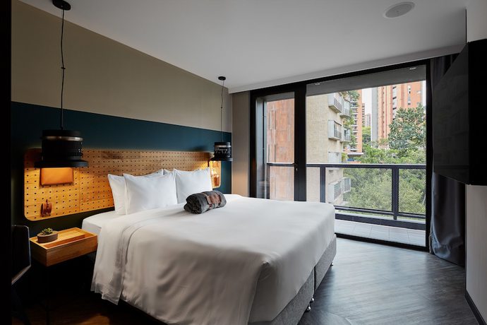 Imagen de la habitación del Hotel The Click Clack Medellin. Foto 5