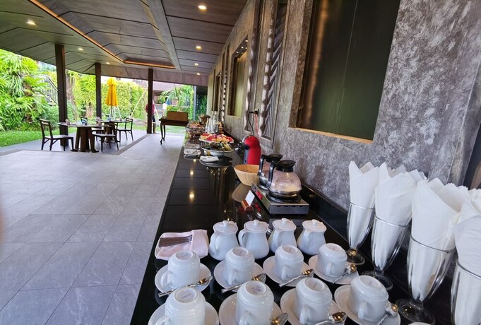 Imagen del bar/restaurante del Hotel The Cliff Elegance Resort. Foto 14