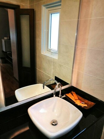 Imagen de la habitación del Hotel The Cliff Elegance Resort. Foto 20