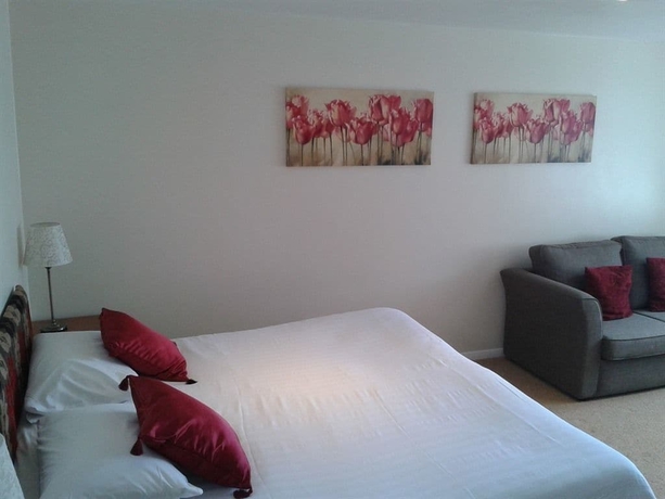 Imagen de la habitación del Hotel The Cliff Hall. Foto 12