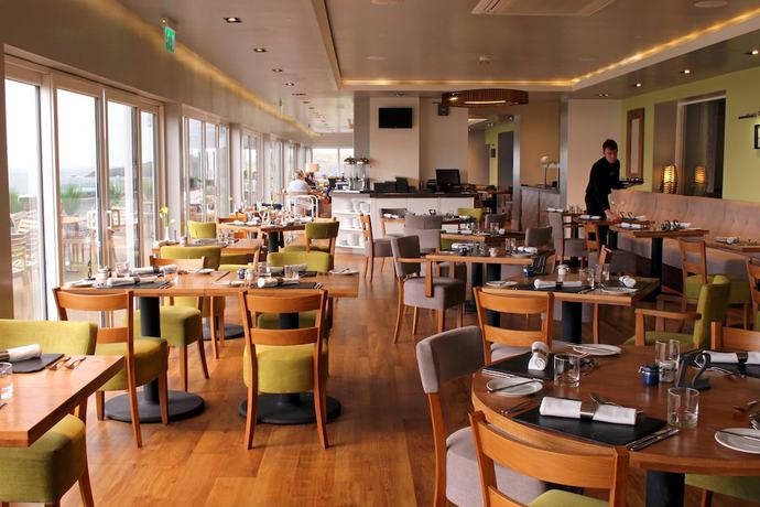 Imagen del bar/restaurante del Hotel The Cliff Hotel And Spa. Foto 2