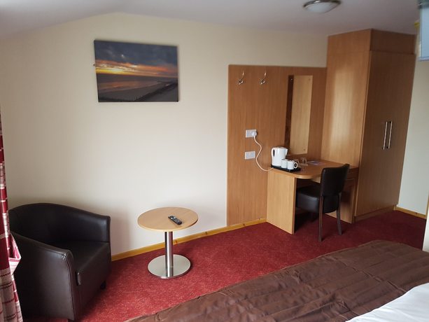 Imagen de la habitación del Hotel The Cliff Top Inn. Foto 9