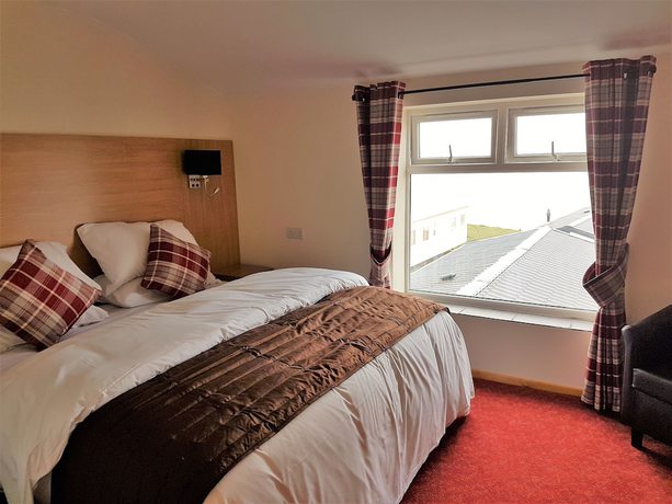 Imagen de la habitación del Hotel The Cliff Top Inn. Foto 10