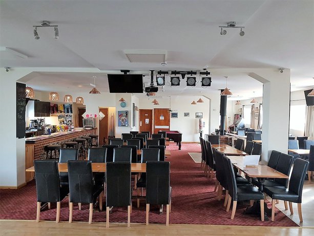 Imagen del bar/restaurante del Hotel The Cliff Top Inn. Foto 4