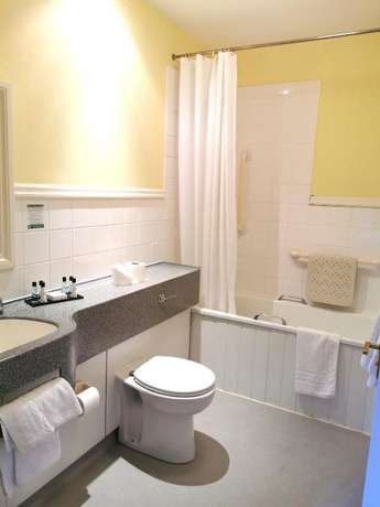 Imagen de la habitación del Hotel The Cliffden. Foto 20