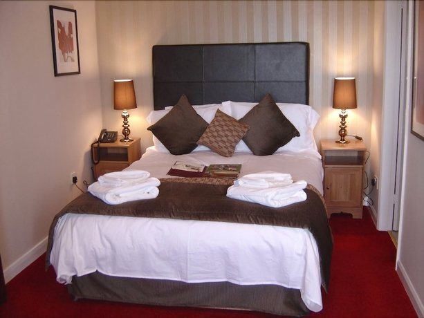 Imagen de la habitación del Hotel The Cliffemount. Foto 12