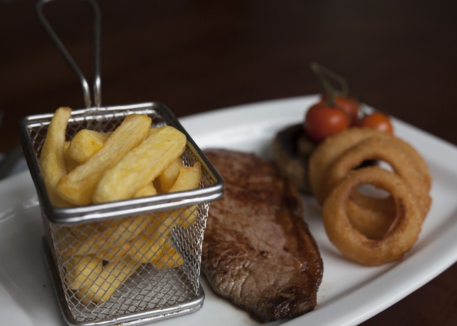 Imagen del bar/restaurante del Hotel The Club House, Kilkenny. Foto 4