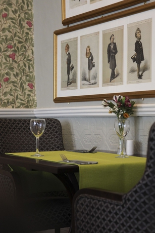 Imagen del bar/restaurante del Hotel The Club House, Kilkenny. Foto 7