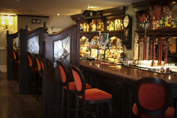 Imagen del bar/restaurante del Hotel The Club House, Kilkenny. Foto 8