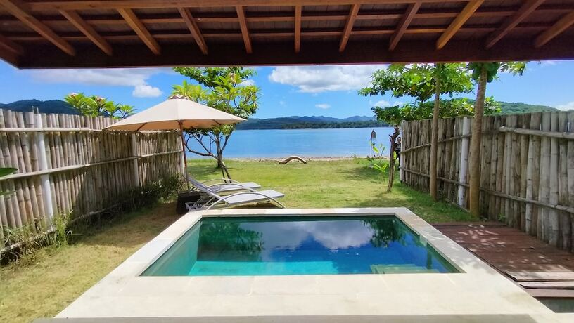 Imagen de la habitación del Hotel The Club Villas Lombok. Foto 13
