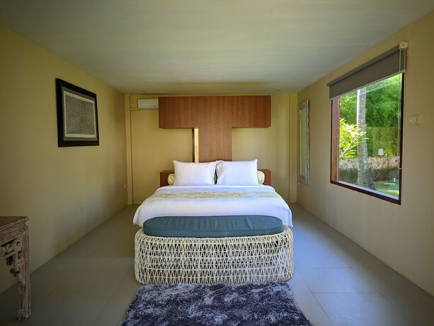 Imagen de la habitación del Hotel The Club Villas Lombok. Foto 14