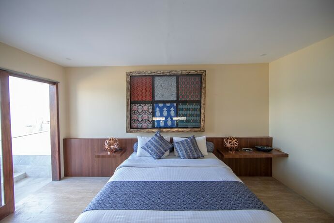 Imagen de la habitación del Hotel The Club Villas Lombok. Foto 15