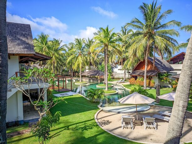 Imagen de la habitación del Hotel The Club Villas Lombok. Foto 17