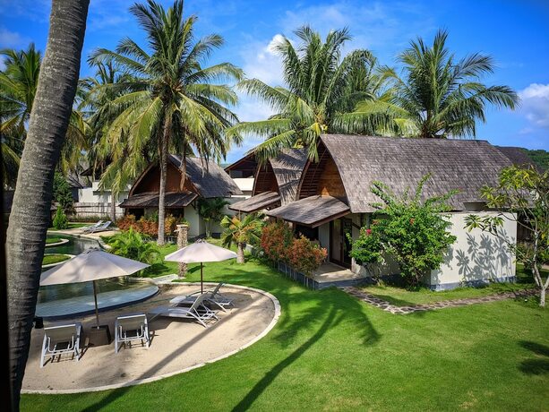 Imagen de la habitación del Hotel The Club Villas Lombok. Foto 20