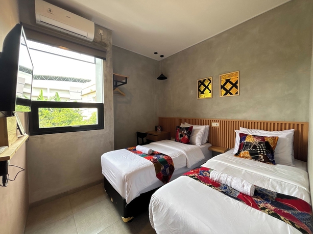 Imagen de la habitación del Hotel The Cluster Harris. Foto 2