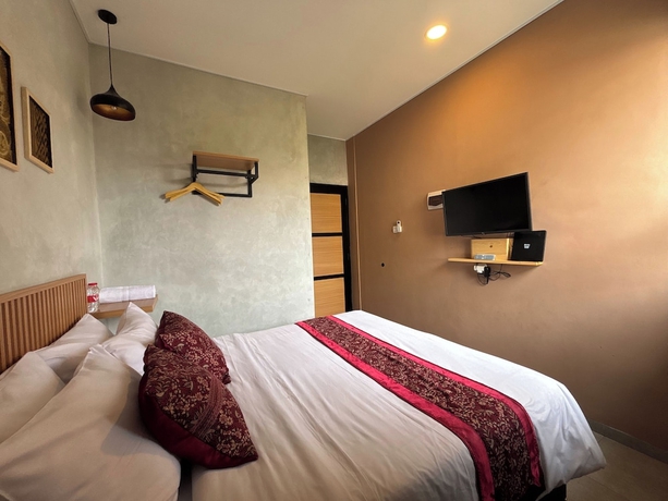 Imagen de la habitación del Hotel The Cluster Harris. Foto 6