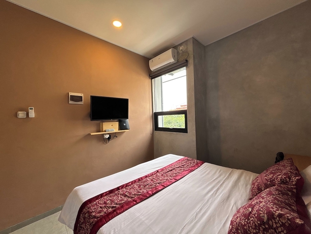 Imagen de la habitación del Hotel The Cluster Harris. Foto 8