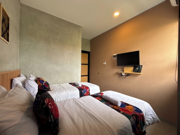 Imagen de la habitación del Hotel The Cluster Harris. Foto 10