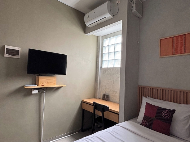 Imagen de la habitación del Hotel The Cluster Harris. Foto 11